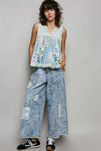 Light blue pol floral sheer tank with lace trim sleeveless top featuring patchwork denim details