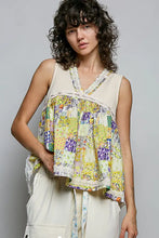 Pol floral v neck sleeveless top with cream ribbed bodice lace trim and vibrant yellow purple green floral patterns