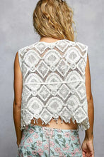White lace crop top with intricate diamond embroidery and scalloped edge fringe trim for stylish summer wear