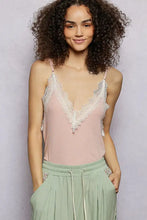 Soft pink pol lace neck ribbed cami tank with delicate white lace trim along the neckline and straps