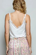 White pol lace v-neck ribbed cami with lace trim and spaghetti straps for a delicate stylish look