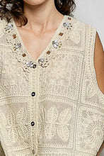 Cream-colored pol lace trim embroidered floral v-neck crochet vest with intricate butterfly embroidery and rhinestones