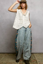 White lace crochet vest with embroidered butterfly patterns and button closures featuring pol lace trim details