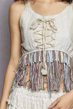 Beige pol lace fringe hem tank featuring a corset-style front lacing and colorful striped trim for stylish wear