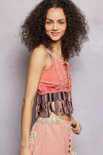 Pink cropped fringe hem tank with lace detailing and lace-up front in lightweight fabric for casual wear