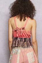 Pink velvet fringe hem tank with ruffled straps tied bow back and black pink patterned fringe hem detail