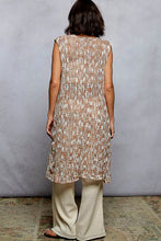 Crochet sleeveless longline cardigan in beige cream woven pattern with metal button