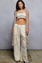 Cream-colored waffle knit pants with POL metal button crochet sleeveless longline cardigan