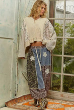 Patchwork maxi skirt with floral and leopard print panels in earthy tones featuring a drawstring waistband for best fit