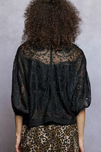 Black lace bolero with intricate floral embroidery and puffed sleeves