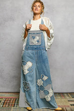 POL open front crochet cardigan with floral embroidery and denim overalls
