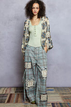 Pol Open floral crochet cardigan with patchwork plaid trousers