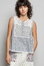 Pol printed woven sleeveless top in soft blue and white floral print with lace trim at neckline and hem