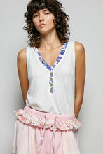 White knitted sleeveless POL ribbed v-neck tank with blue contrast floral neckband and wooden buttons