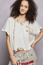 White ribbed cotton pol short sleeve hooded top with floral patchwork and tie-side accents back open detail