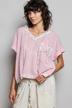 Pink ribbed cotton pol short sleeve hooded top with floral lace trim and matching pocket detailing