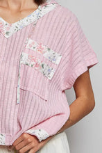 Pol short sleeve hooded top in pink ribbed knit with floral patchwork on neckline front pockets and cuffs