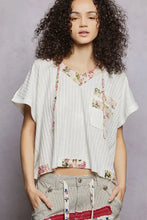 Pol short sleeve hooded top in white with floral trim and patch pockets featuring back-open detail