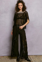 Black sheer mesh pol texture raw hem top with beaded neckline and fringed sleeves short sleeve design