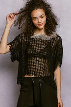 Black sheer mesh top with fringed neckline short sleeves featuring pol texture raw hem detail