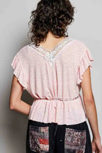 Pink short sleeve blouse with ruffled tied v-neck, lace trim, and gathered waistband by POL