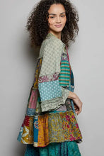 Pol tiered floral patchwork jacket with vibrant teal gold and floral patterned fabrics in bohemian style