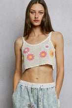 White crocheted cropped crochet cami with u-neck and colorful floral embroidery in pink yellow and blue