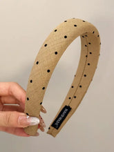 Tan polka dot polyester wide headband with handmade label