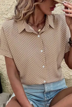 Beige short-sleeved button-up shirt with white polka dots perfect for casual summer wear