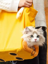 Borsa portatile traspirante per animali a forma di gatto giallo con impronte di zampe e orecchie da coniglio