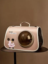 Transportadora para animais de estimação com janela bolha rosa e design de monstrinho