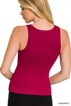 A fitted sleeveless cabernet red premium rayon double layered tank top with a round neck and smooth fabric
