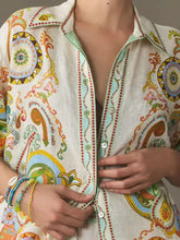 Vibrant off-white linen printed button up shirt with psychedelic paisley swirls