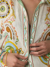 Vibrant printed button-up shirt from Printed Button Up Shirt and Shorts Set with psychedelic pattern