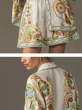 Printed button-up shirt and shorts set in colorful paisley eye pattern