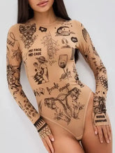 Beige long sleeve bodysuit featuring intricate black ink-style tattoo-inspired graphics and text printed on the sleeve bodysuit