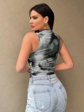 A sleek printed mock neck ruched tank with sleeveless design and gray black tie-dye pattern for casual wear