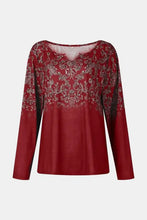 Red printed notched long sleeve t-shirt in gold paisley pattern