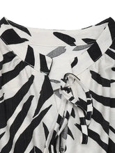 Printed Notched Sleeveless Midi Dress Casual Dresses