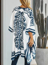 Printed open front cover-up in white and navy blue patterned kaftan top