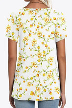 Women’s white printed petal sleeve V-neck blouse with yellow floral pattern