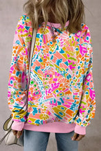 Printed round neck long sleeve sweatshirt in vibrant multicolored design