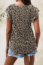 Printed round neck short sleeve top with distressed denim shorts