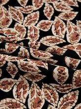 Smocked bodice maxi dress in black paisley with red leaf pattern