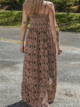 Printed smocked bodice maxi dress with red and black leaf pattern