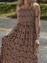 Printed smocked bodice maxi dress with red and black leaf pattern