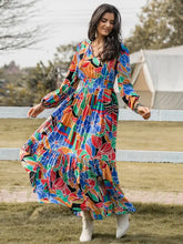 Printed smocked tie balloon sleeve maxi dress with abstract floral print
