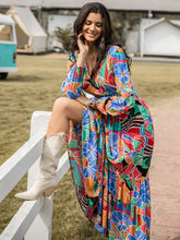 Printed smocked tie balloon sleeve maxi dress with abstract floral pattern