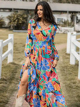 Printed smocked tie balloon sleeve maxi dress with abstract floral pattern