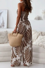 Printed smocked tube wide leg jumpsuit in off-white with brown florals